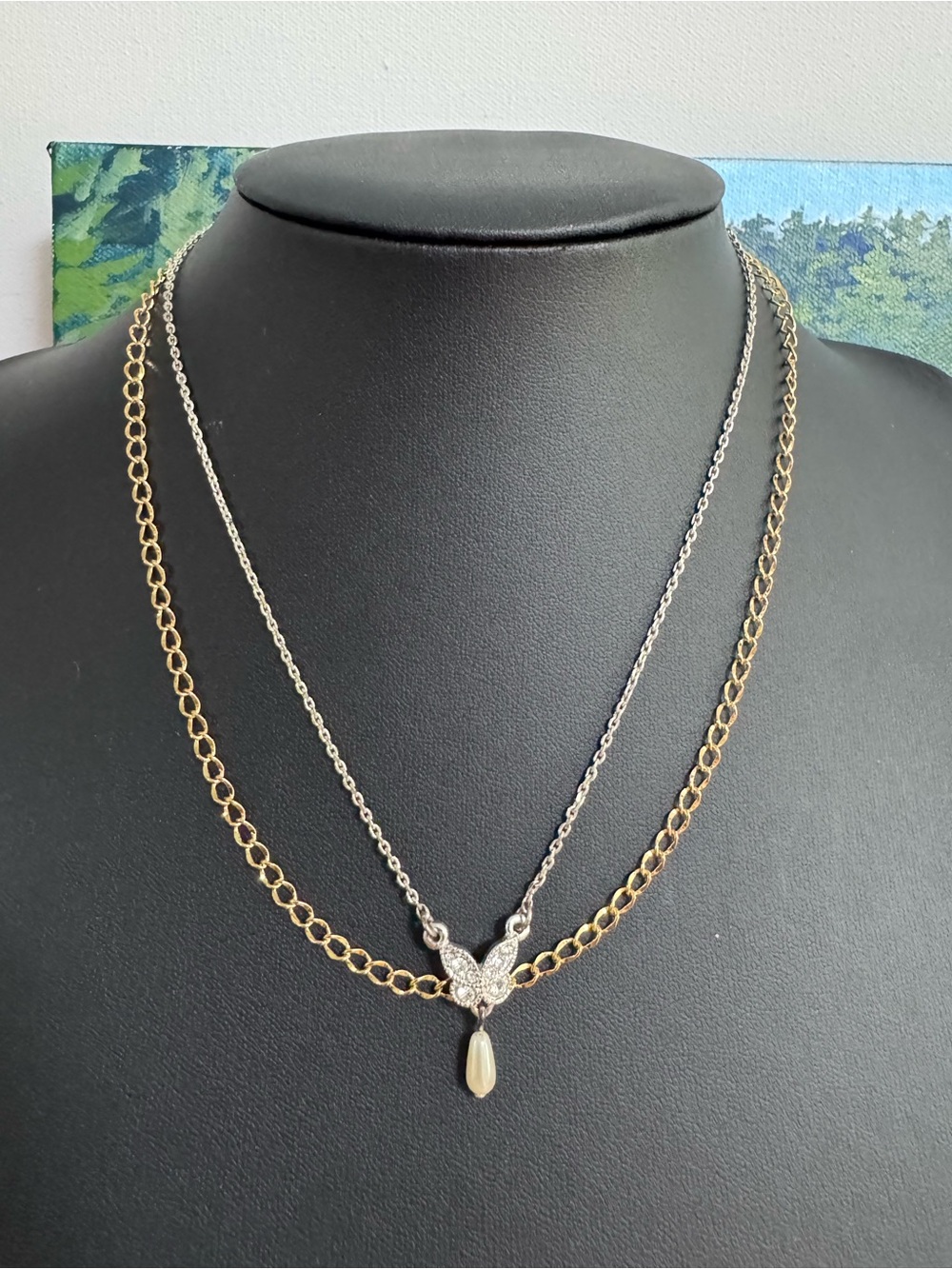 Two vintage Avon necklaces.